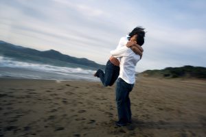 People_hugging_in_the_beach-300x200